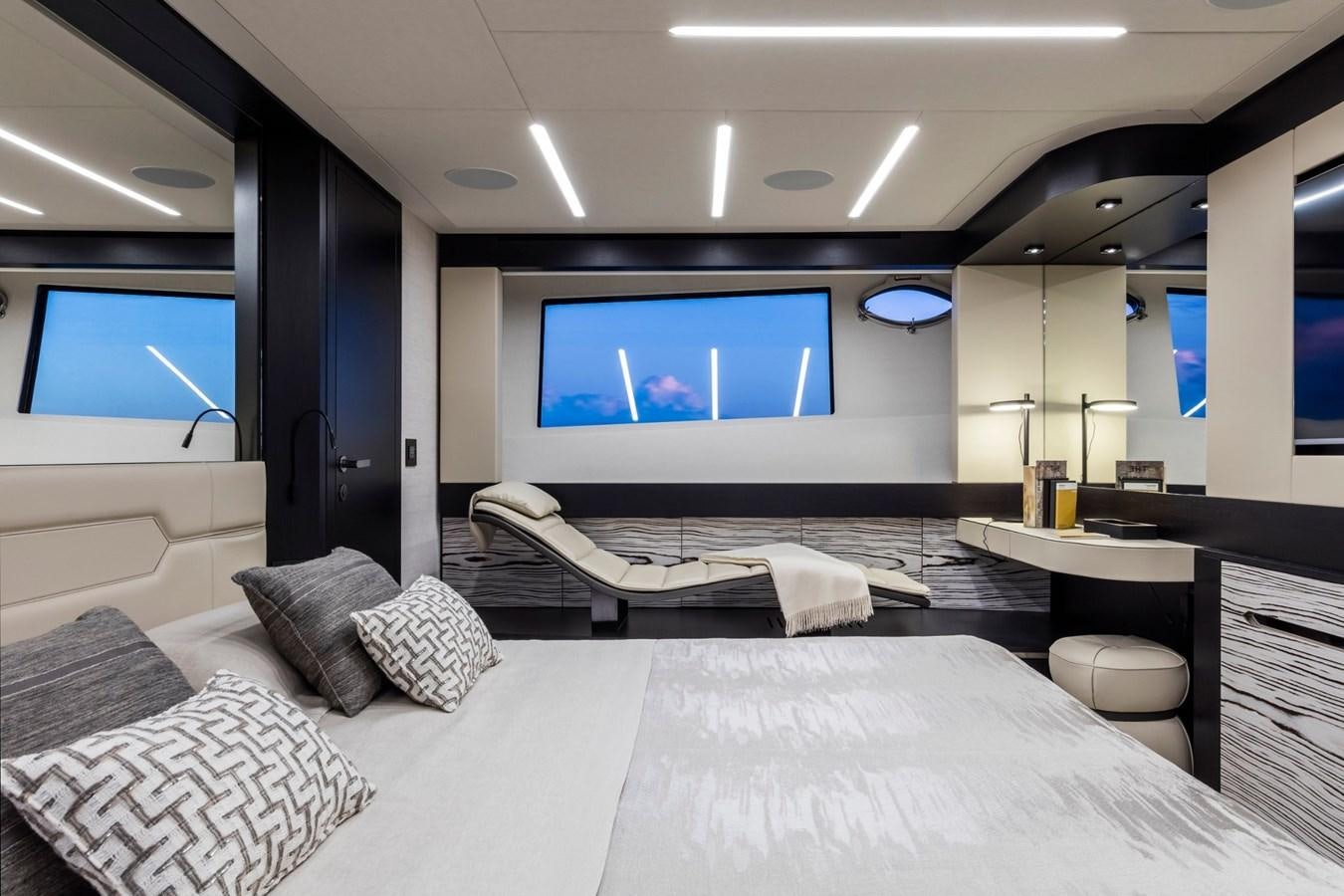 a large bed in a room aboard PERSHING 8X   Yacht for Sale