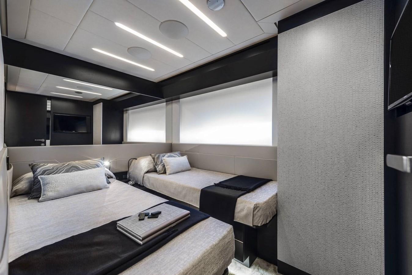 a room with two beds aboard PERSHING 8X   Yacht for Sale