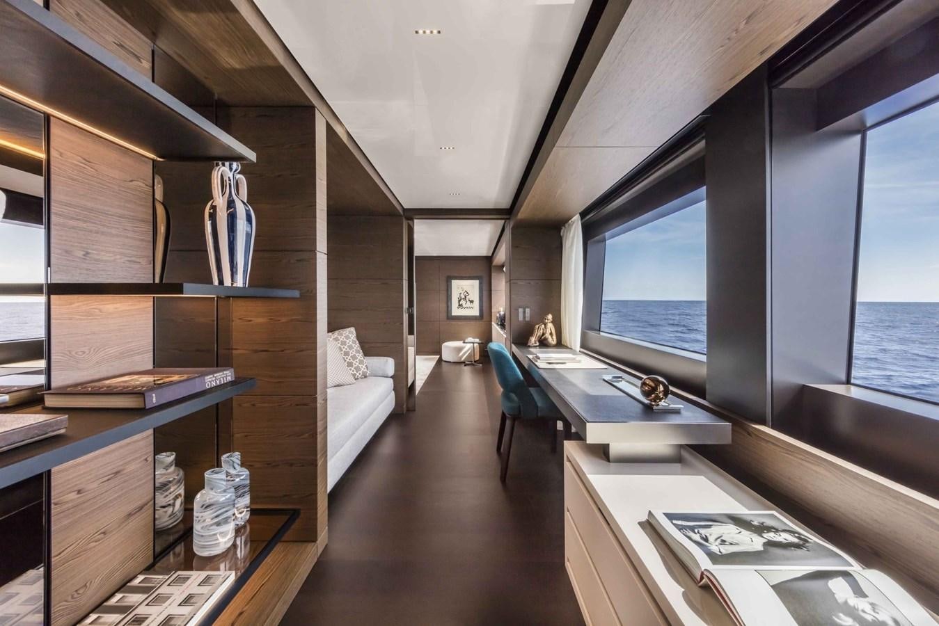 a room with a bed and a desk aboard CUSTOM LINE NAVETTA 42/10 Yacht for Sale