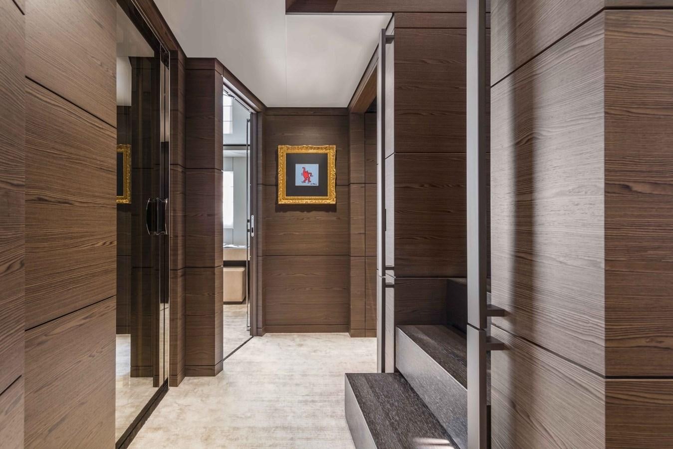a hallway with wood walls aboard CUSTOM LINE NAVETTA 42/10 Yacht for Sale