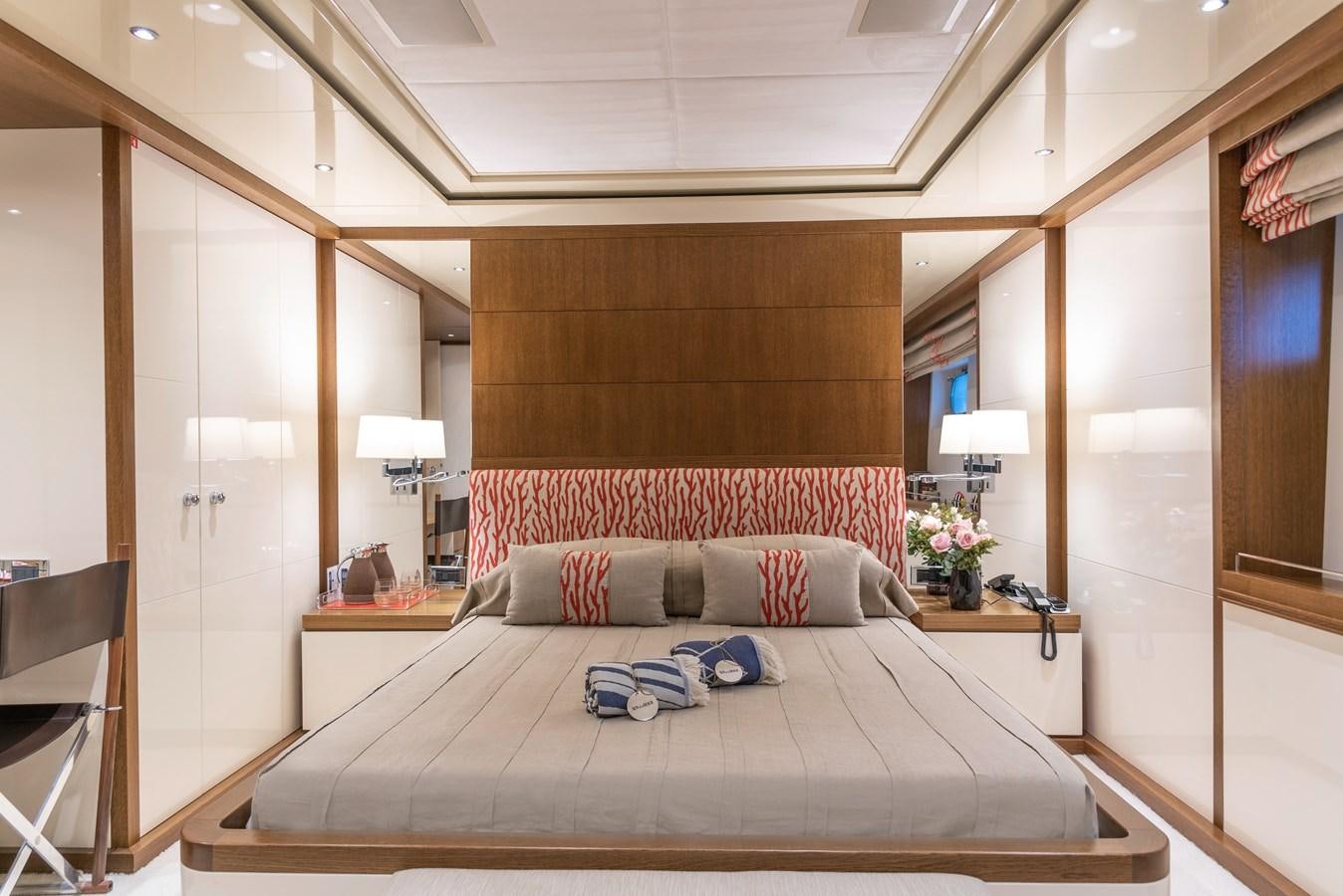 a bed in a hotel room aboard IRAVATI Yacht for Sale