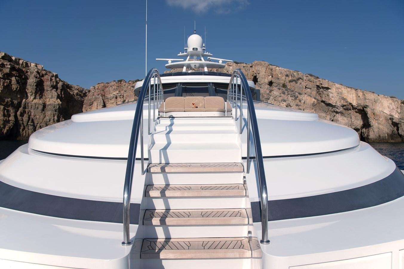 a white boat with a white tower aboard IRAVATI Yacht for Sale