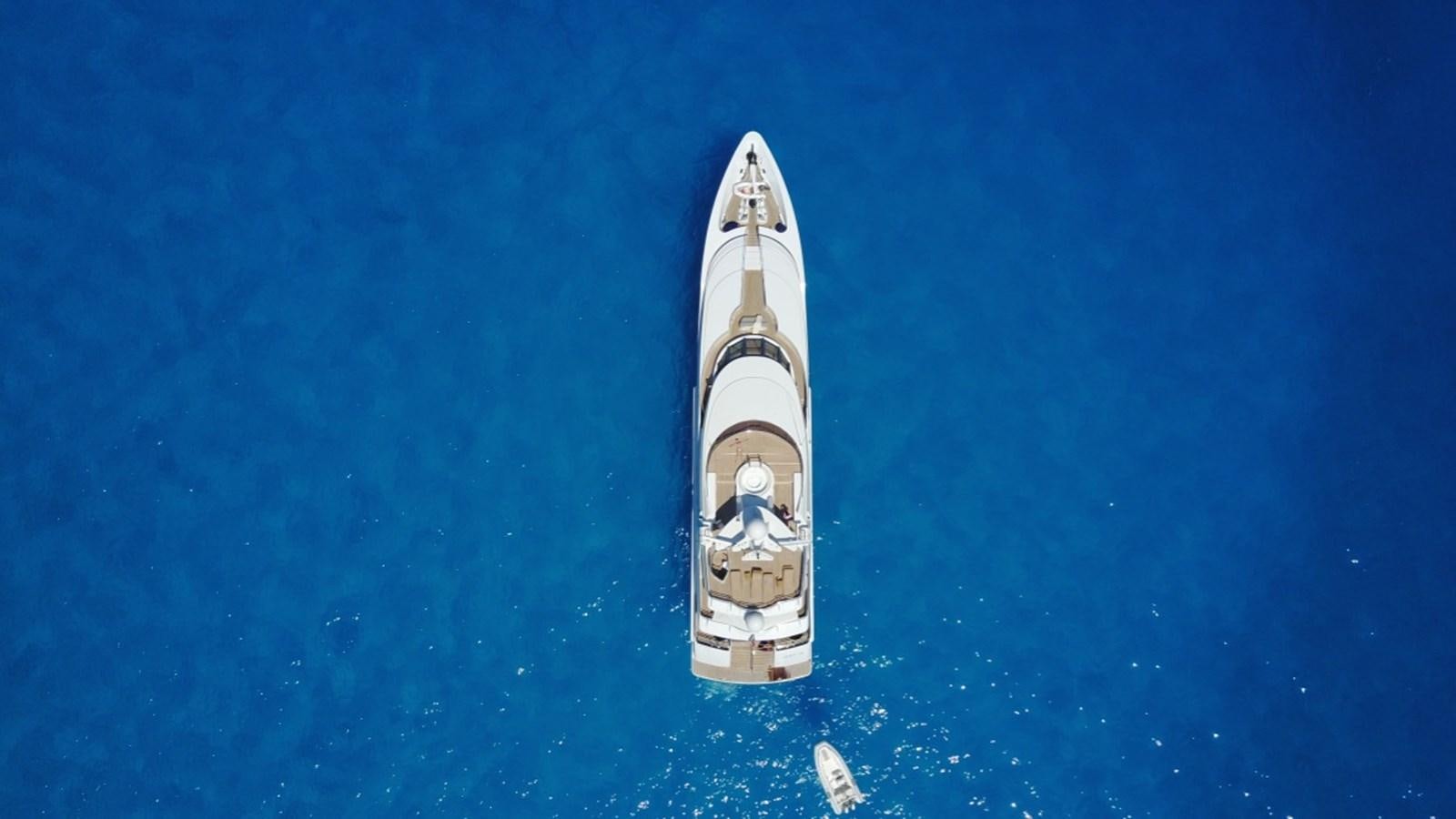 a white boat in the water aboard IRAVATI Yacht for Sale