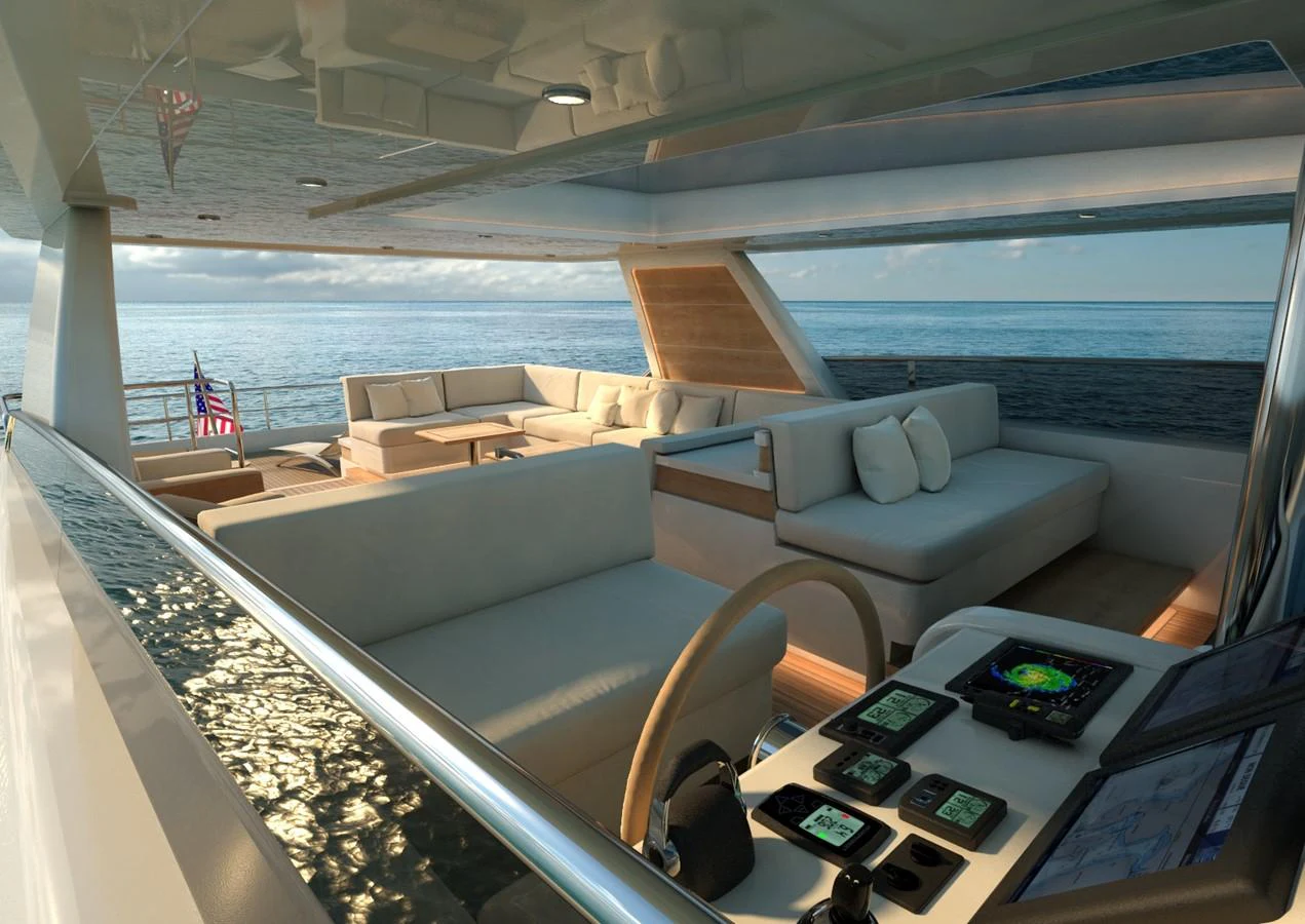 a large boat with a couch and a table in the middle aboard BURGER 120 Yacht for Sale