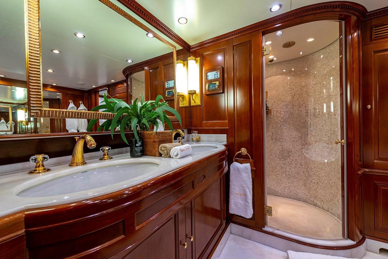 a bathroom with a large mirror aboard NEW STAR Yacht for Sale