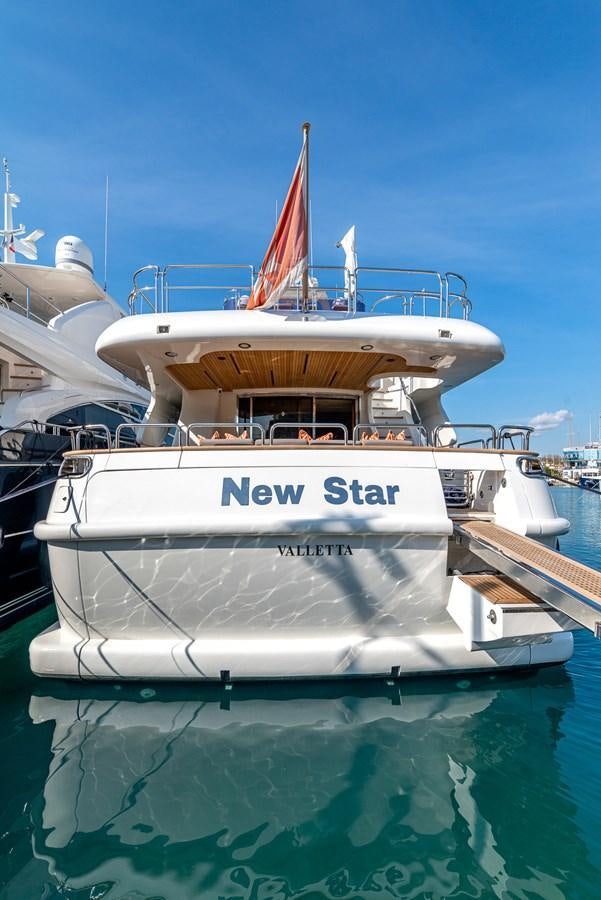 a white boat in the water aboard NEW STAR Yacht for Sale