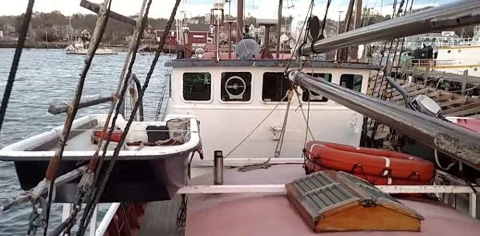 a boat docked at a pier aboard 1963 TRAWLER DE HASS NORTH SEA, WANDERBIRD  Yacht for Sale