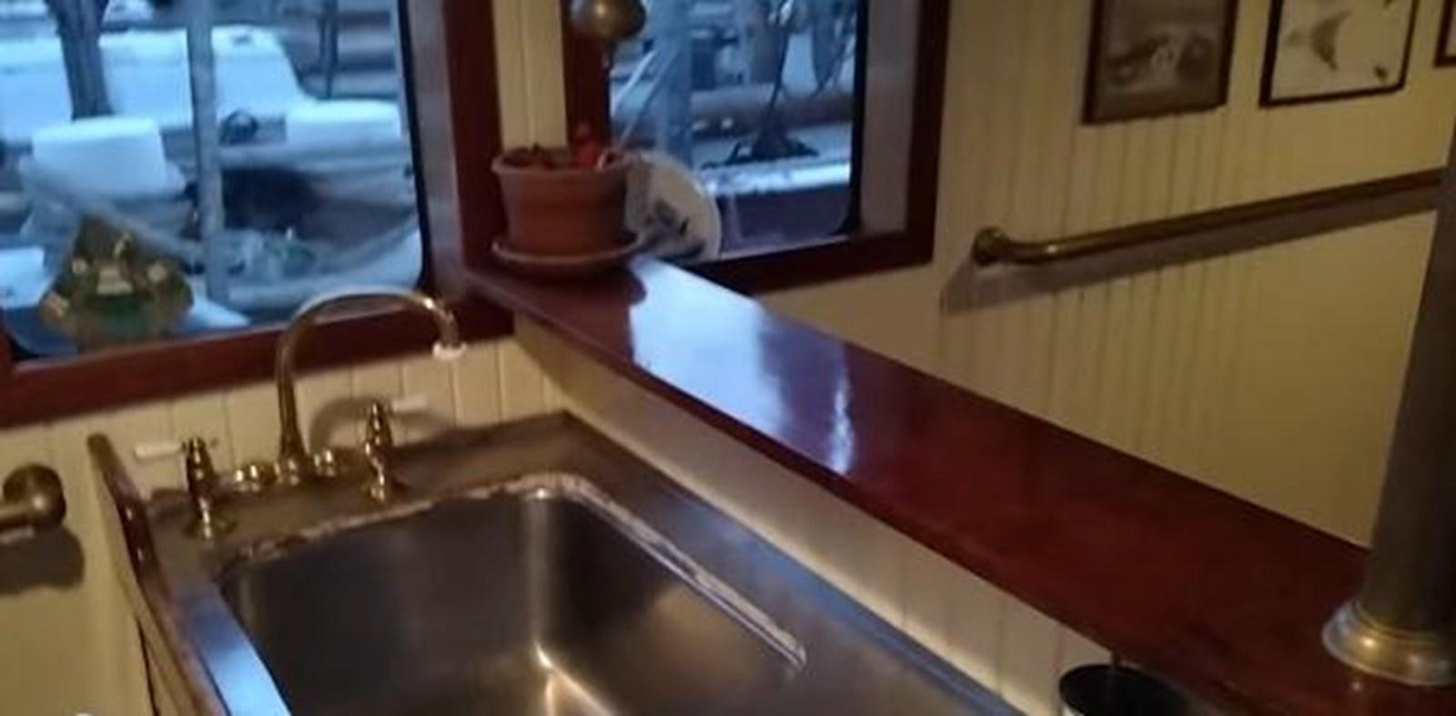 a sink with a faucet aboard 1963 TRAWLER DE HASS NORTH SEA, WANDERBIRD  Yacht for Sale