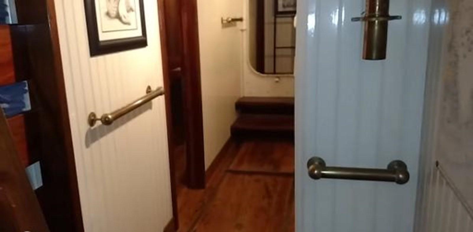 a door with a handle aboard 1963 TRAWLER DE HASS NORTH SEA, WANDERBIRD  Yacht for Sale