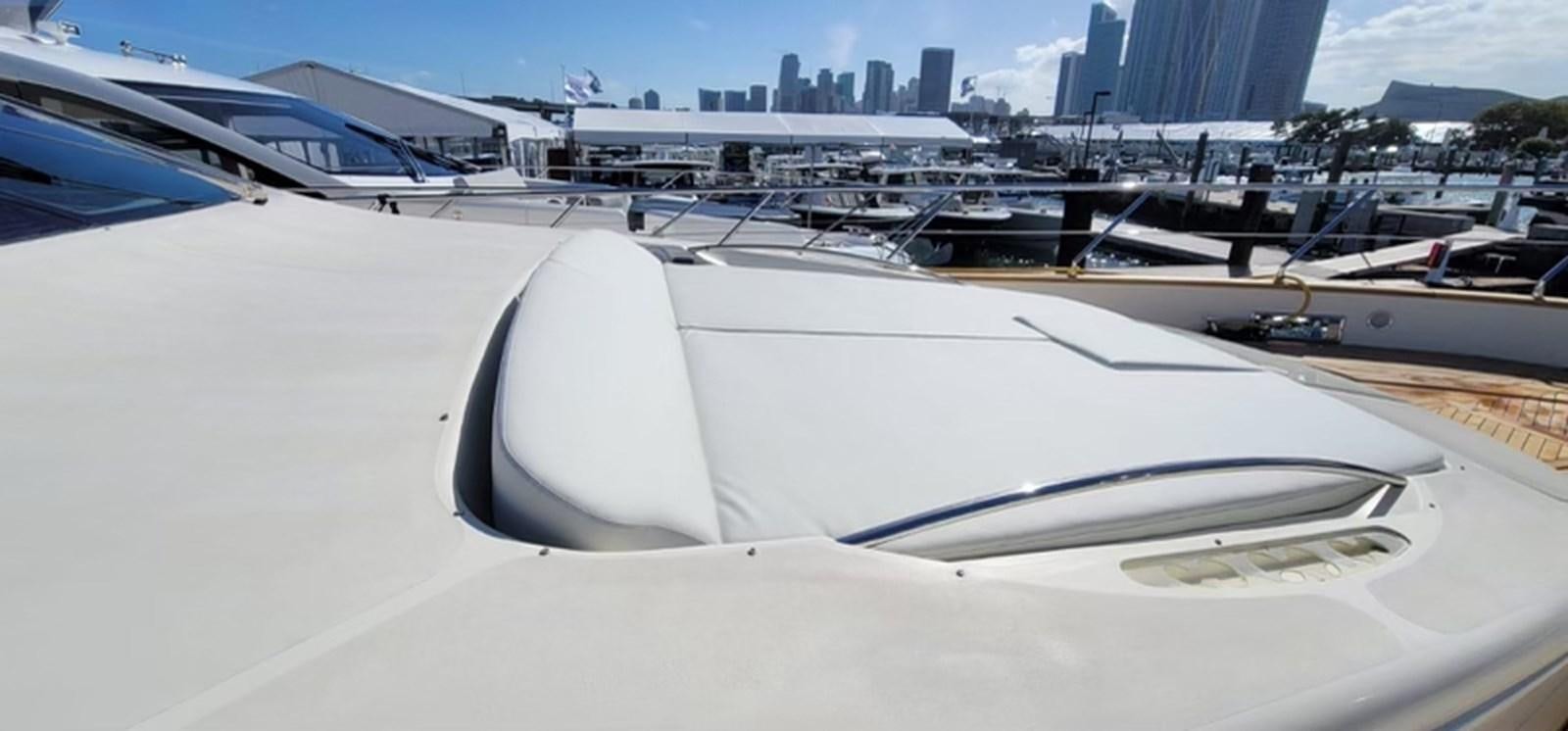 a white boat in a harbor aboard THINKS 'S HIS TOO Yacht for Sale