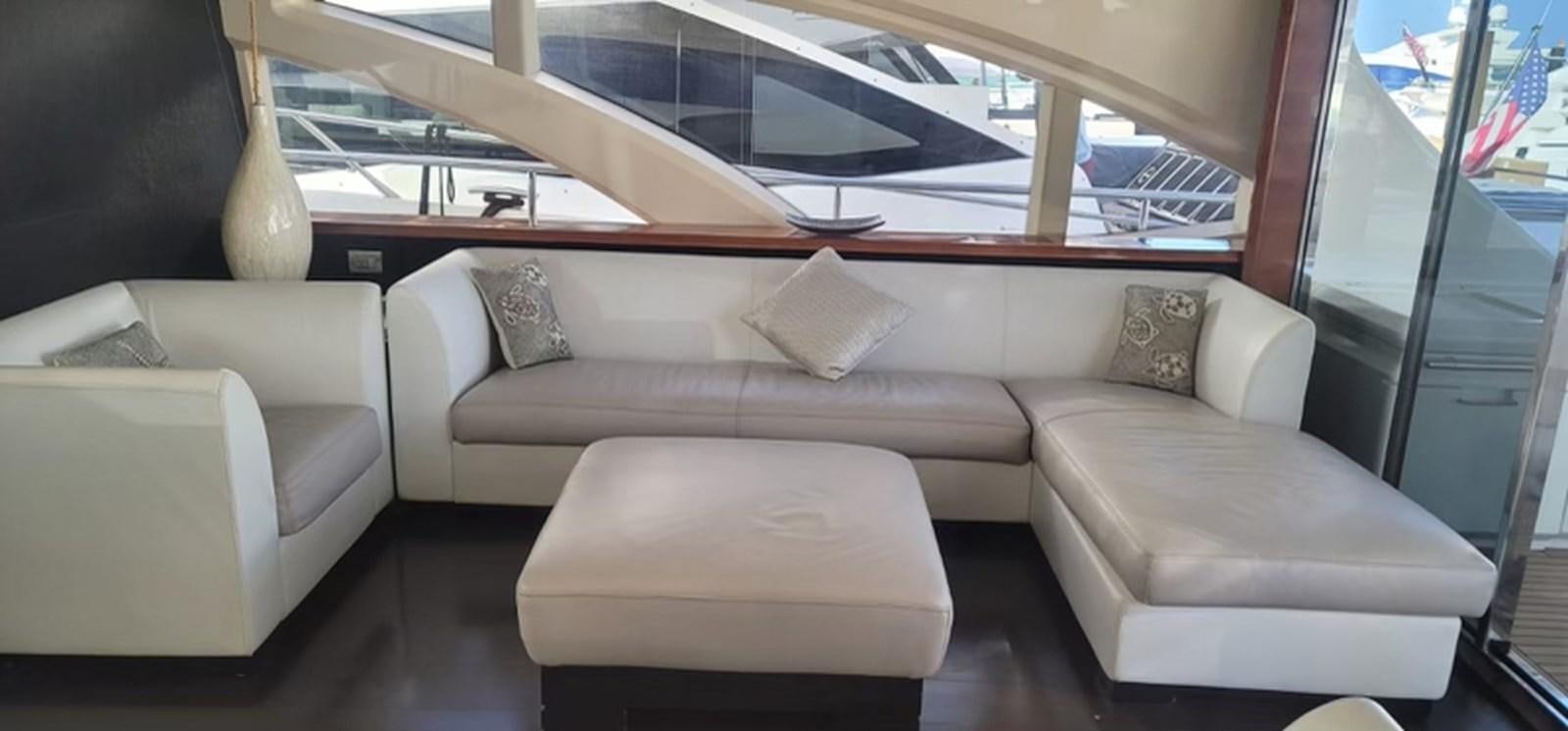 a couch in a room aboard THINKS 'S HIS TOO Yacht for Sale
