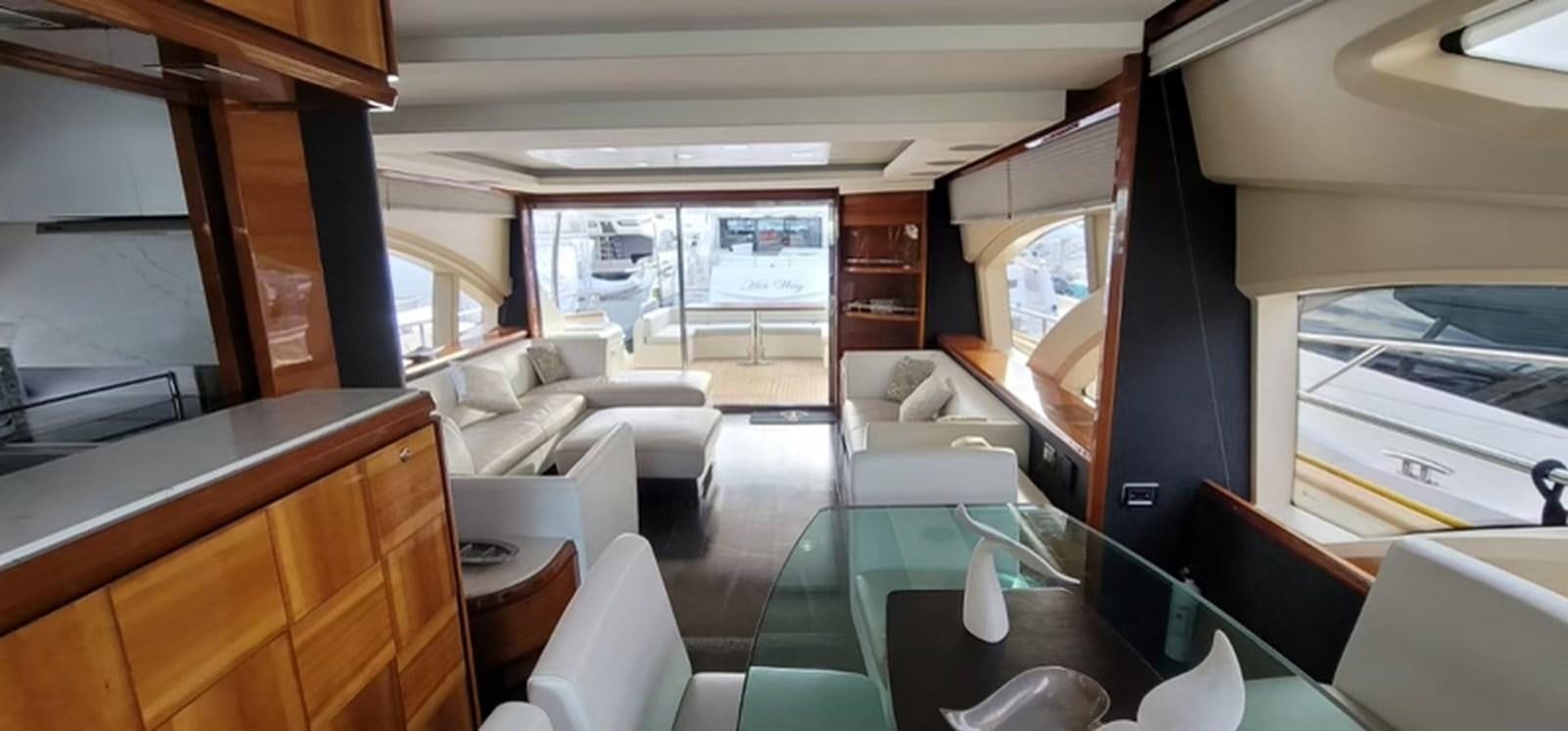 inside of a vehicle with a table and chairs and a window aboard THINKS 'S HIS TOO Yacht for Sale