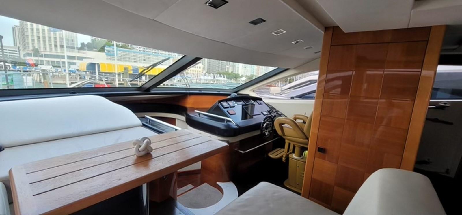 a desk with a laptop and a printer on it aboard THINKS 'S HIS TOO Yacht for Sale
