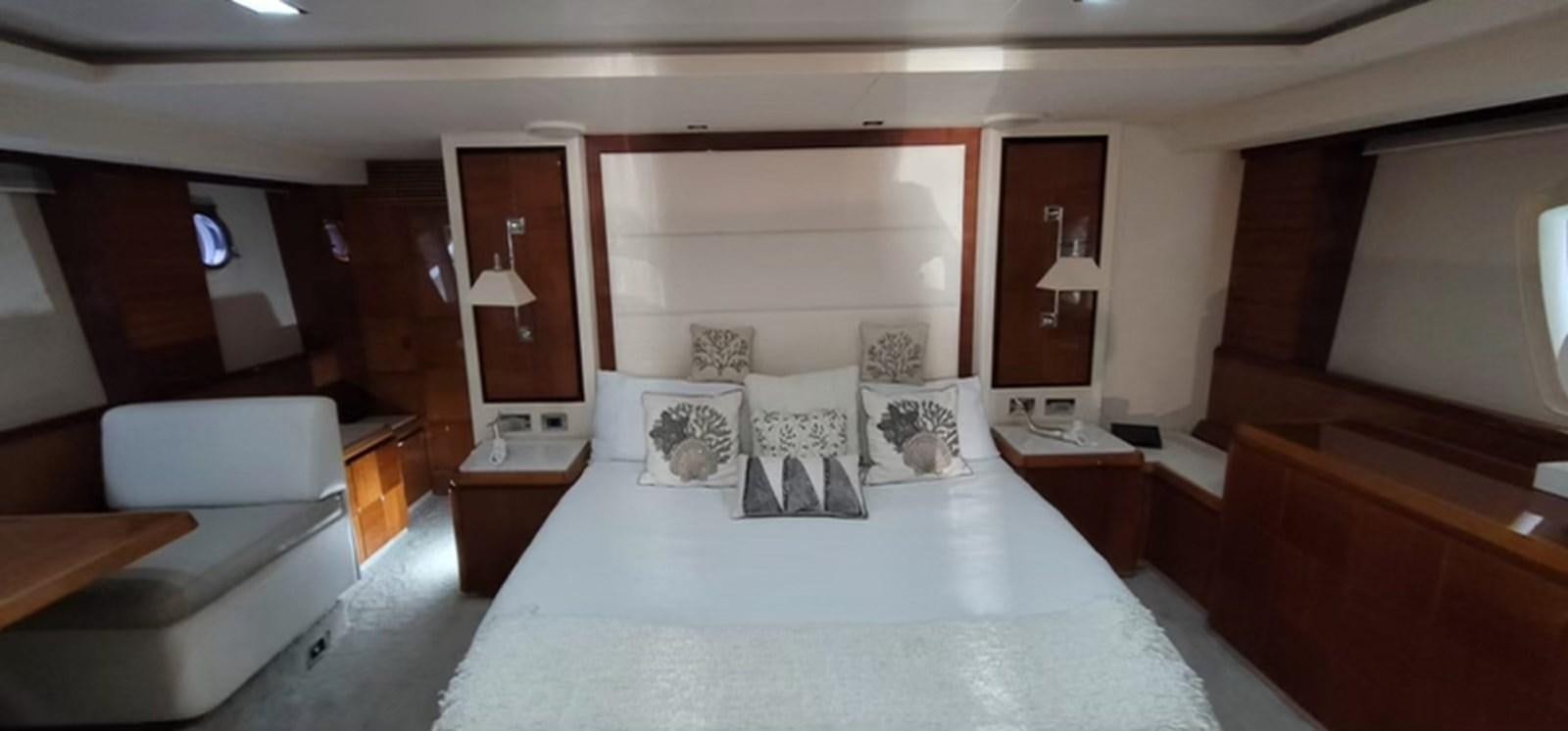 a bed in a room aboard THINKS 'S HIS TOO Yacht for Sale