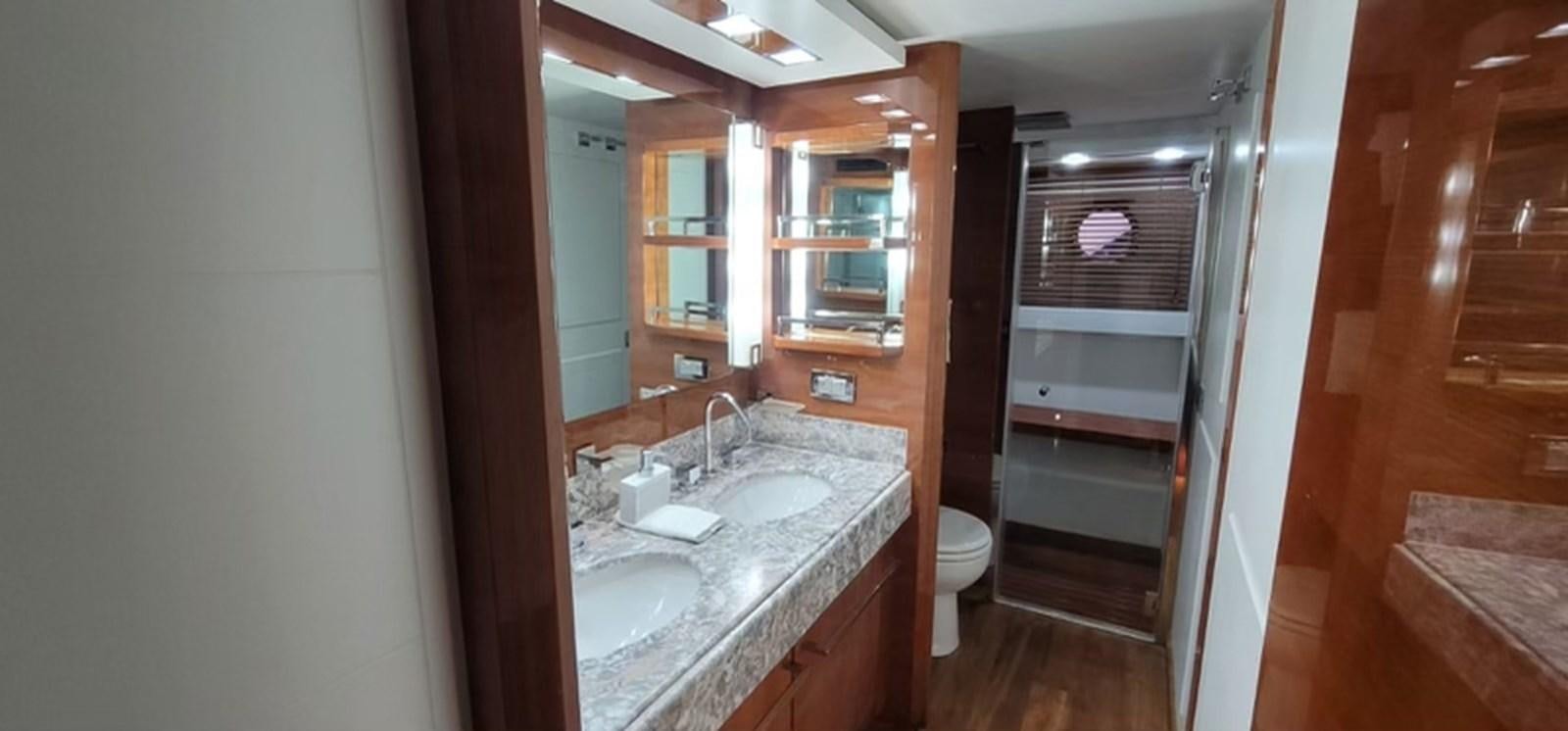 a bathroom with a sink and a toilet aboard THINKS 'S HIS TOO Yacht for Sale