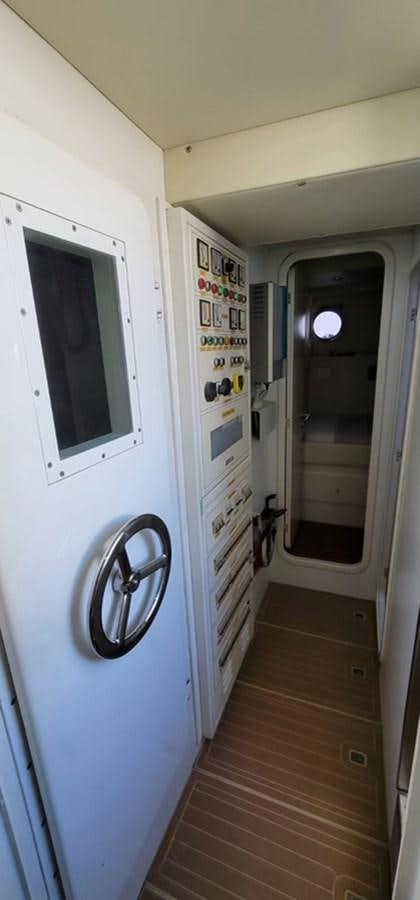 a white door with a handle aboard THINKS 'S HIS TOO Yacht for Sale