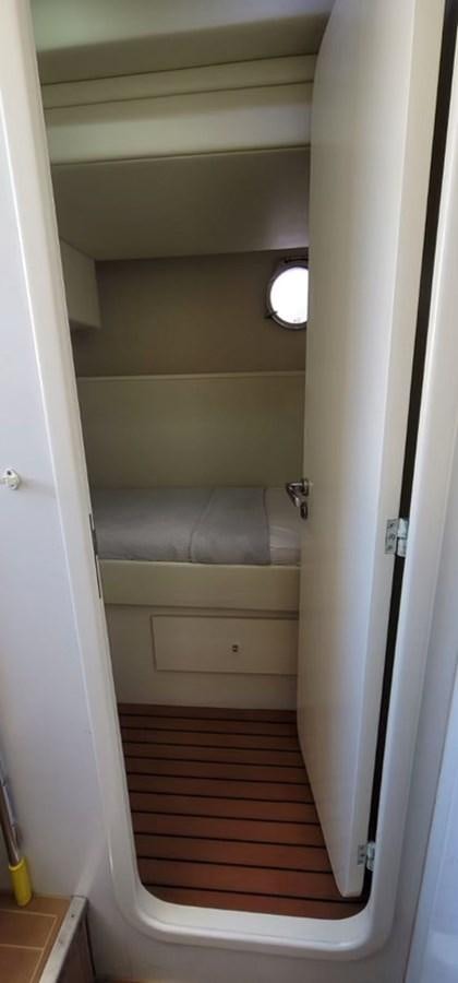 a white door with a light on it aboard THINKS 'S HIS TOO Yacht for Sale