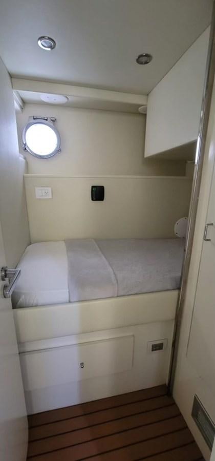 a small room with a bed aboard THINKS 'S HIS TOO Yacht for Sale