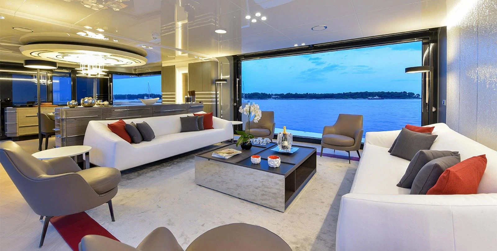 a living room with a large window aboard ARIA.S Yacht for Sale