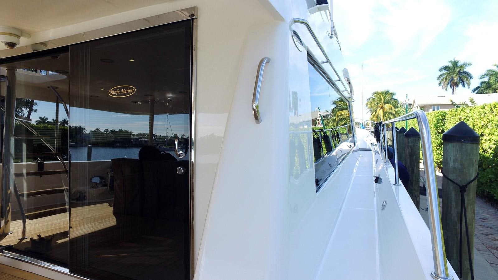 a white boat with a door open aboard HARBOR LADY Yacht for Sale