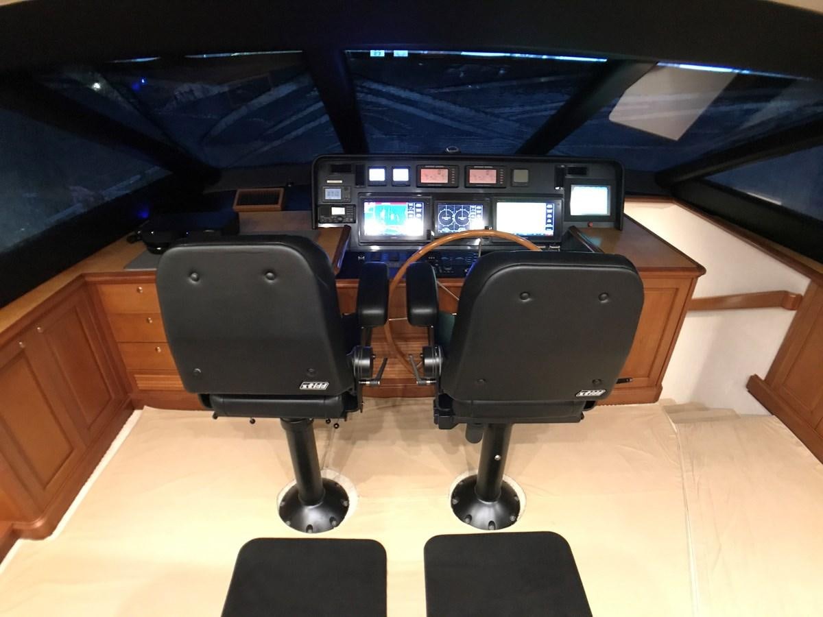 a black chair in a room aboard HARBOR LADY Yacht for Sale