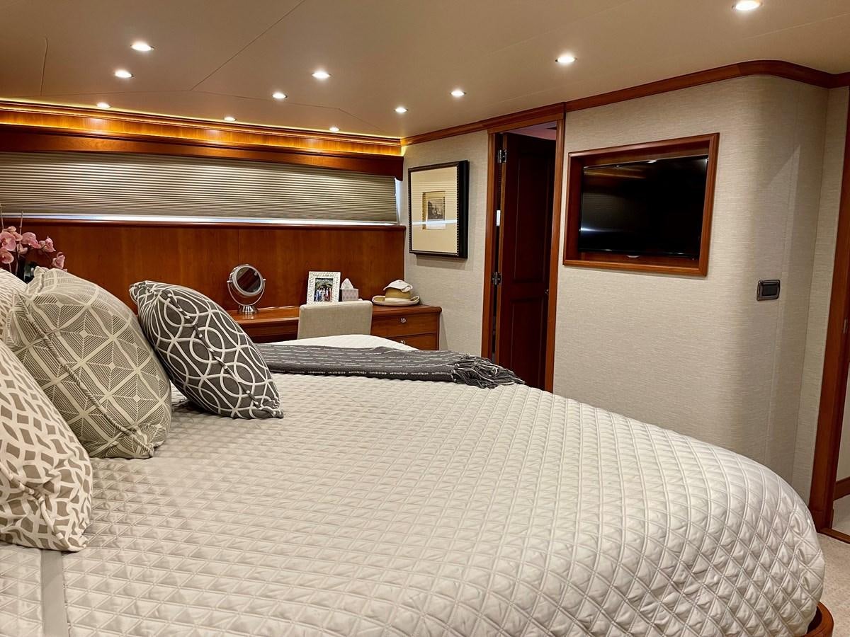 a hotel room with a bed aboard HARBOR LADY Yacht for Sale