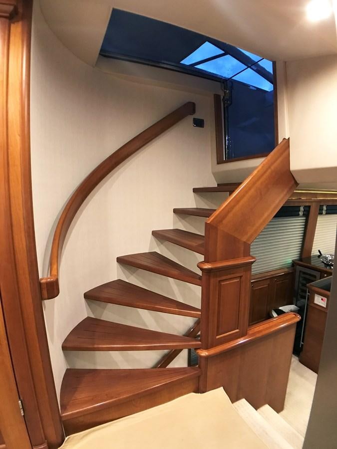 a wooden staircase in a room aboard HARBOR LADY Yacht for Sale