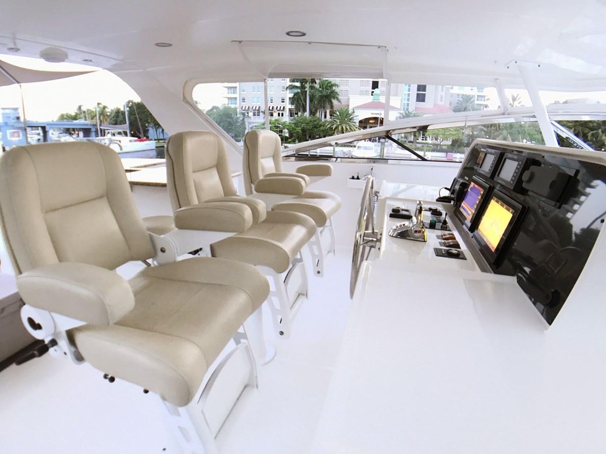 inside of a vehicle with a large screen and a large window aboard HARBOR LADY Yacht for Sale