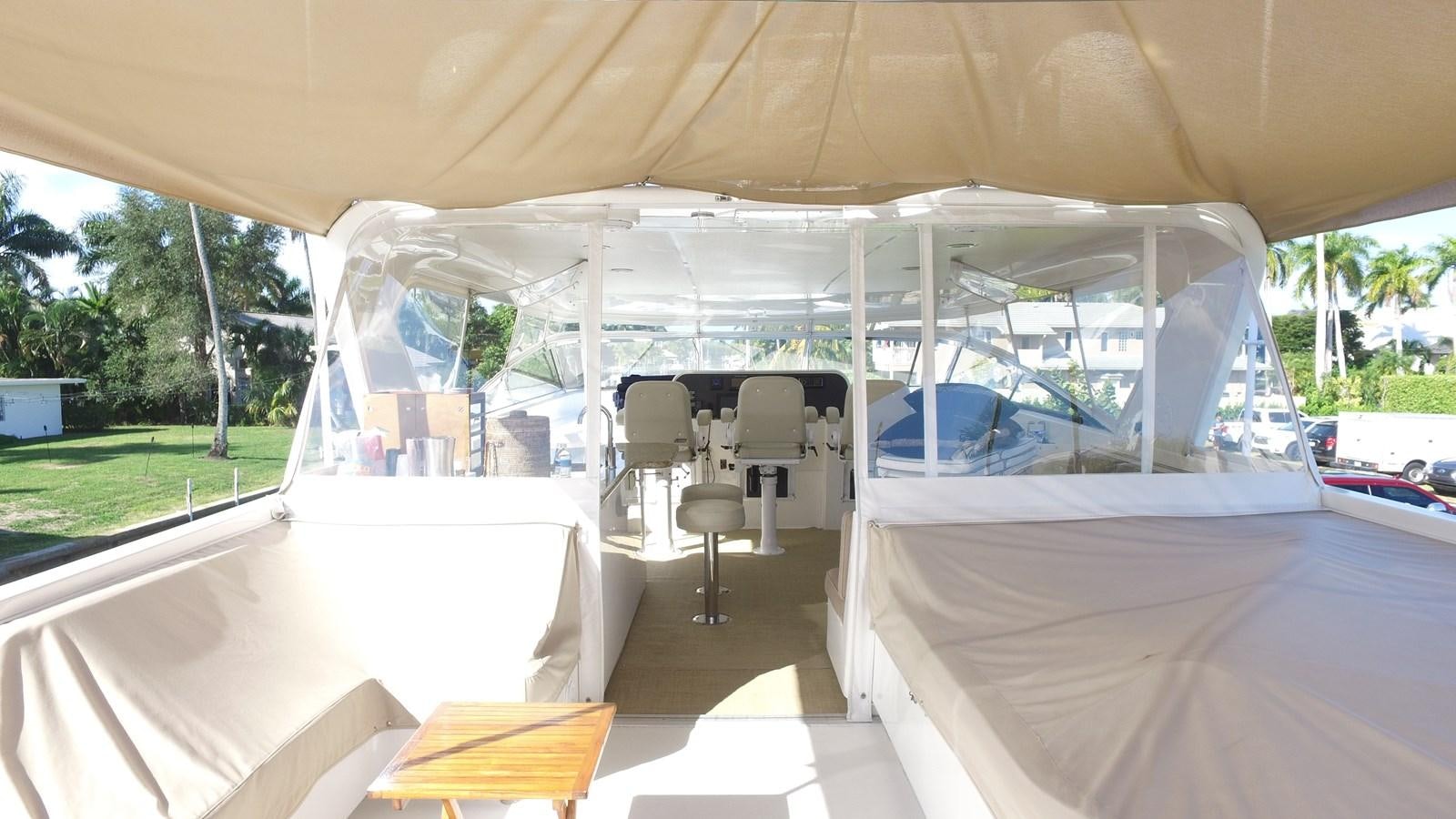 a tent with chairs and tables aboard HARBOR LADY Yacht for Sale