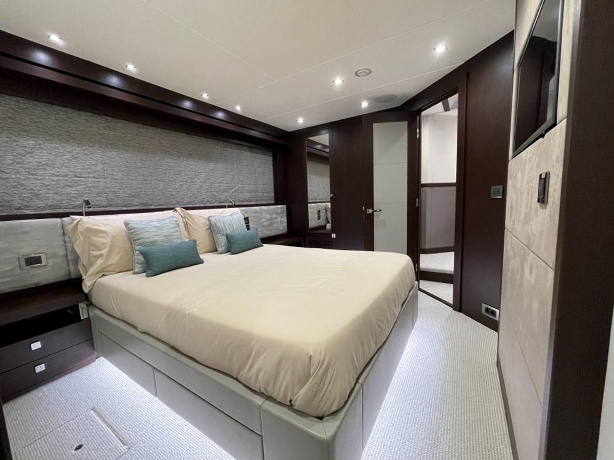 a large bedroom with a bed aboard SUNSEEKER 95 Yacht for Sale