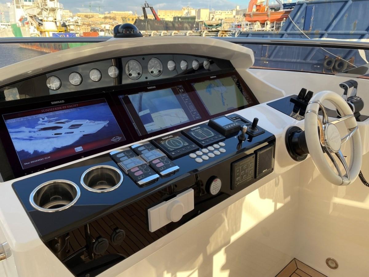 a control panel on a boat aboard SUNSEEKER 95 Yacht for Sale