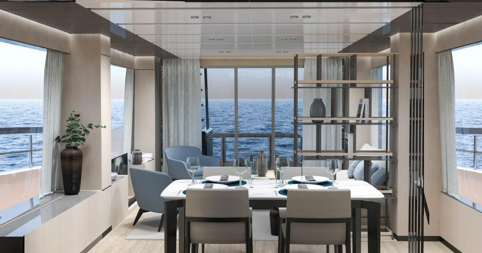 a room with a table and chairs aboard 2022 MENGI YAY  Yacht for Sale