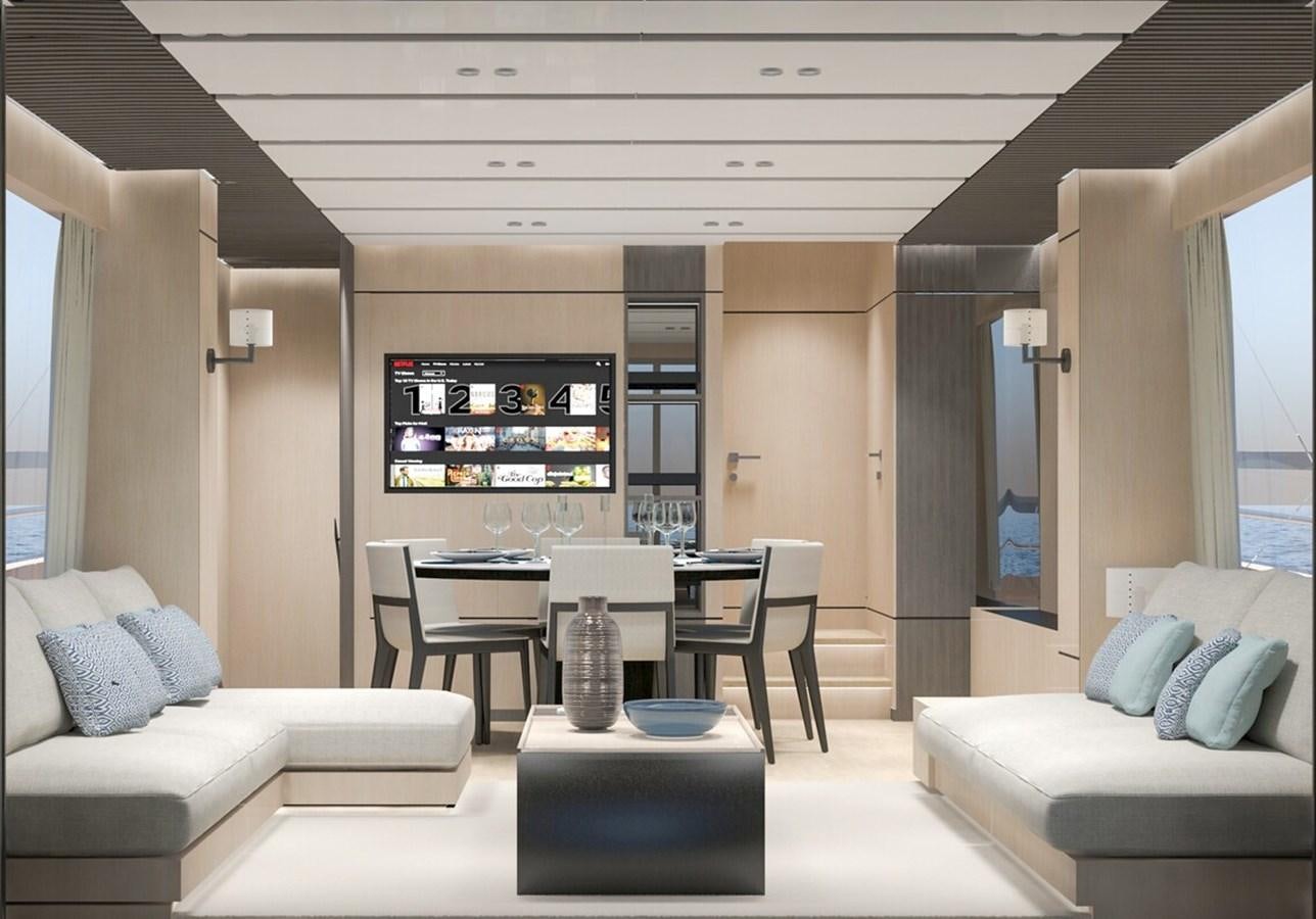 a room with a couch and a table aboard 2022 MENGI YAY  Yacht for Sale