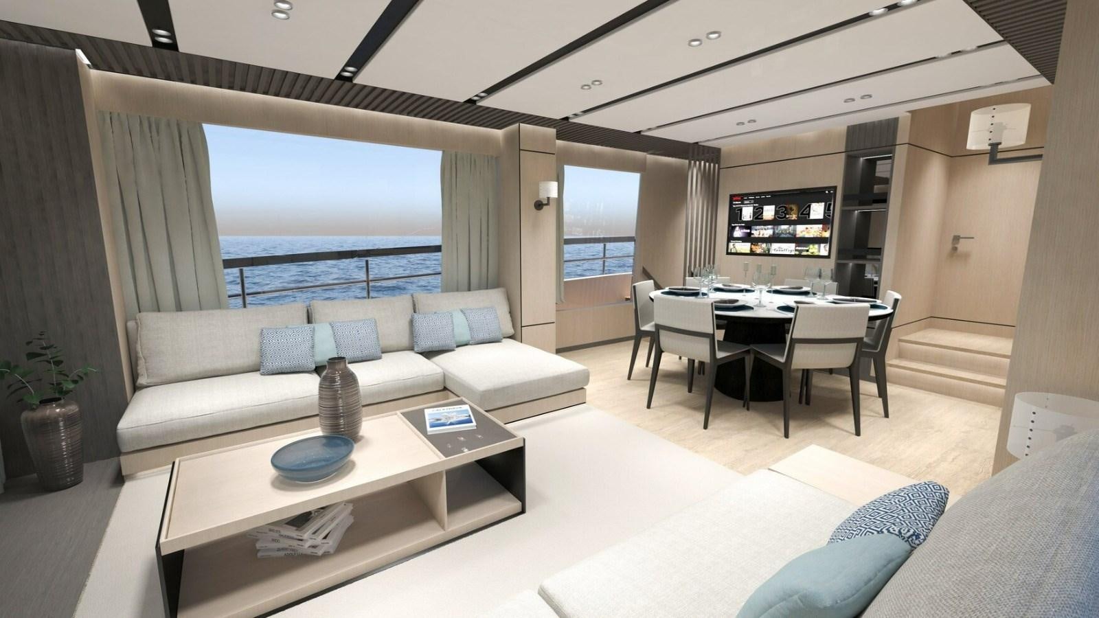 a living room with a couch and a table aboard 2022 MENGI YAY  Yacht for Sale