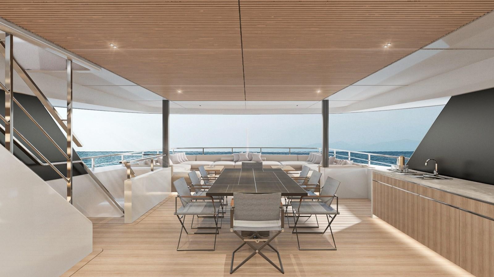 a room with a table and chairs aboard CONRAD C144S HULL #4 Yacht for Sale