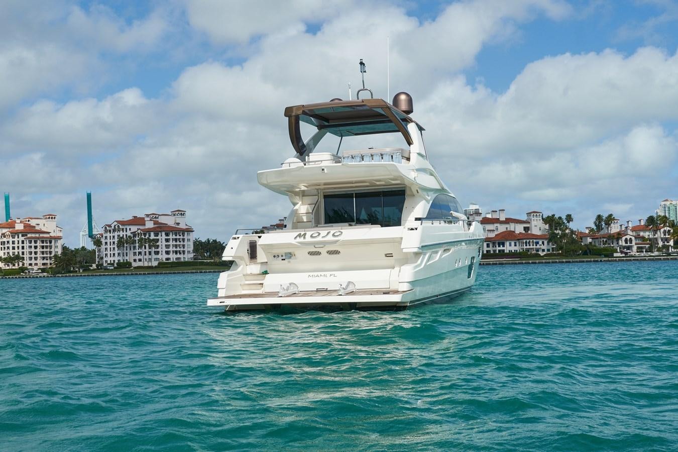 a boat in the water aboard Mojo Yacht for Sale