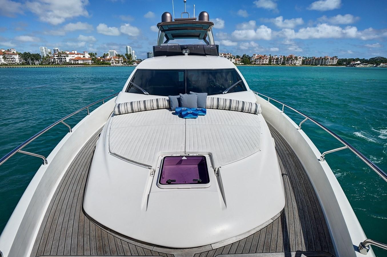 a boat on the water aboard Mojo Yacht for Sale