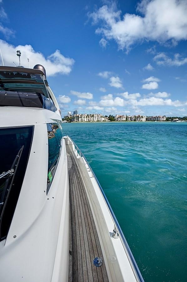 a boat on the water aboard Mojo Yacht for Sale