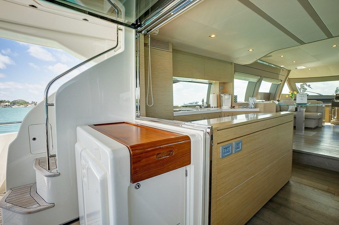 a kitchen with a large window aboard Mojo Yacht for Sale