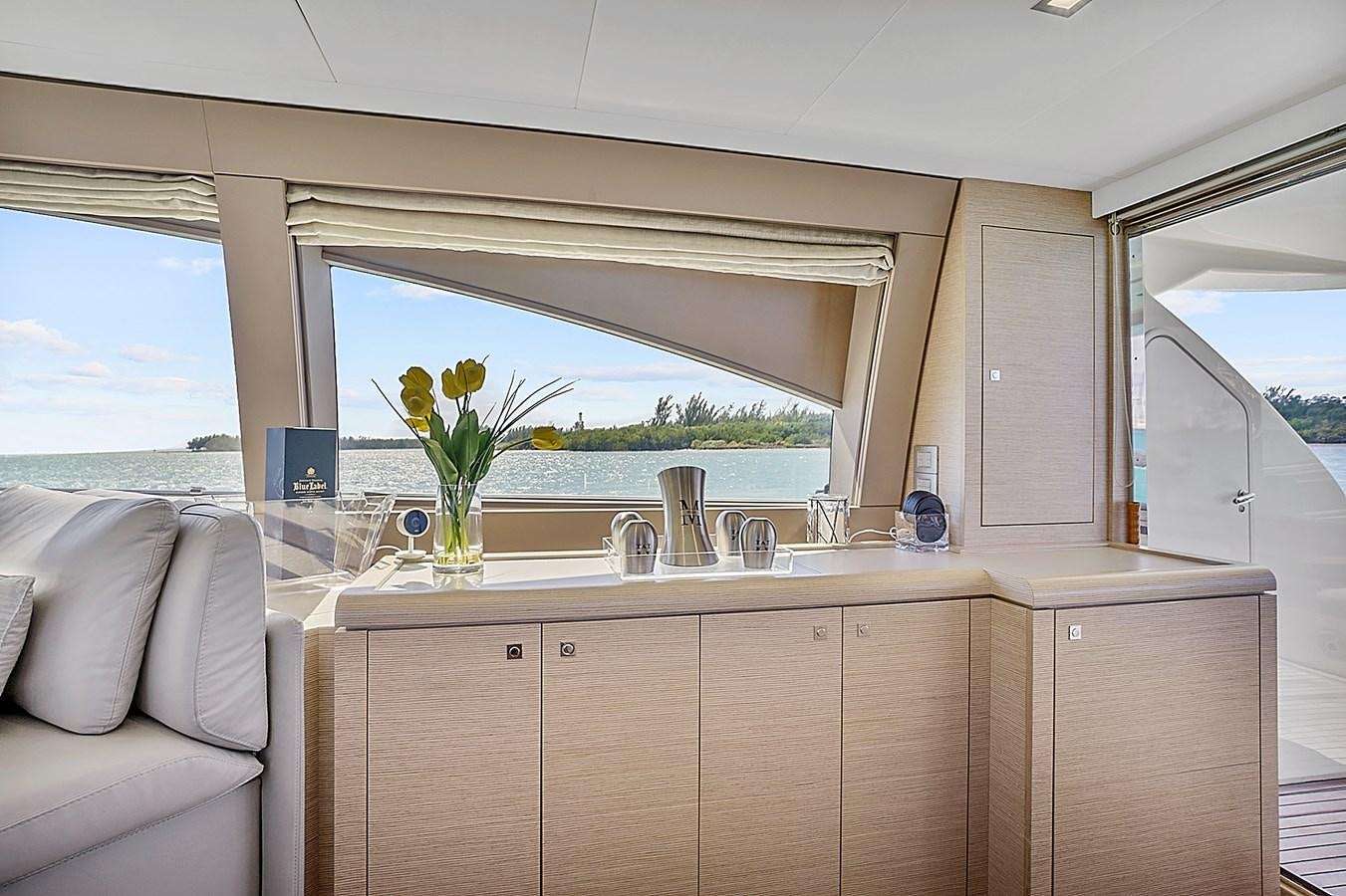 a kitchen with a plant on the counter aboard Mojo Yacht for Sale