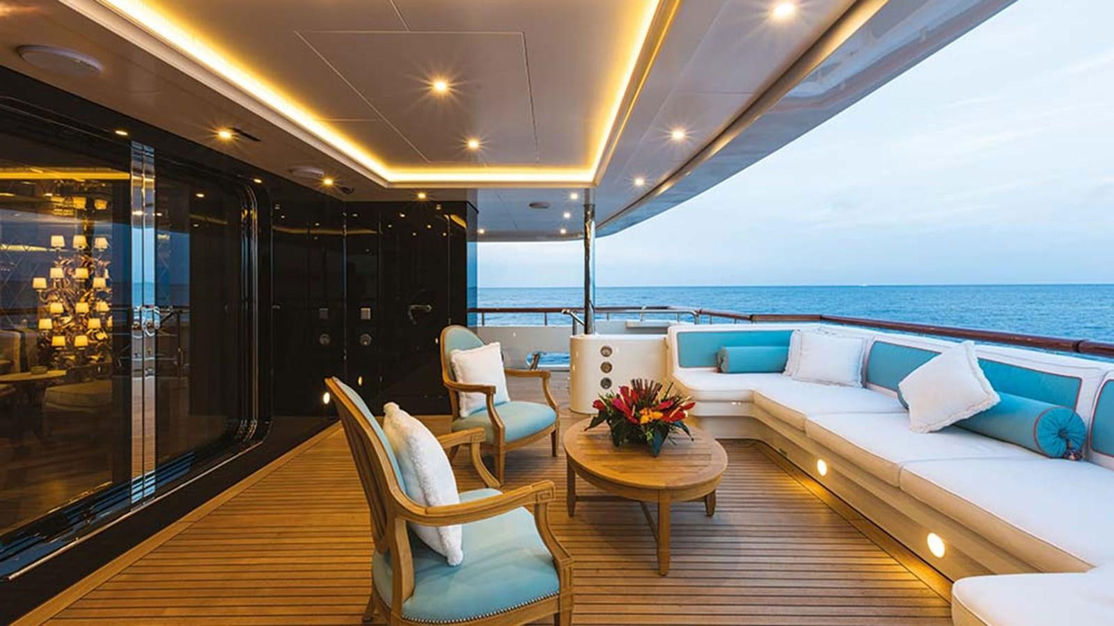 a room with a view of the ocean and the deck aboard SEAKID II Yacht for Sale