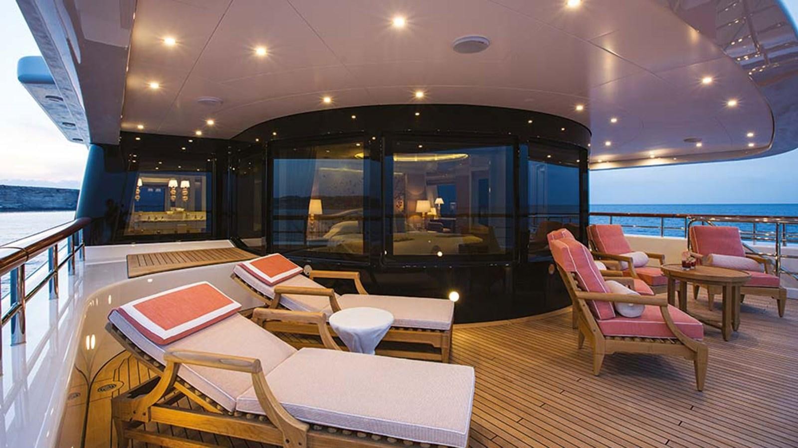 a room with tables and chairs aboard SEAKID II Yacht for Sale