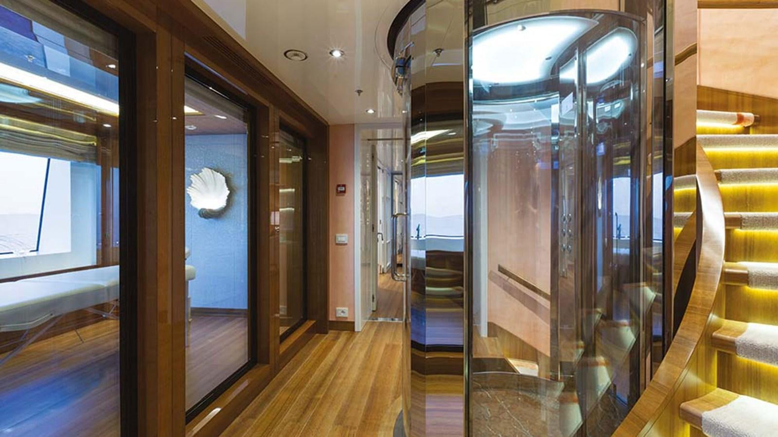 a room with glass doors aboard SEAKID II Yacht for Sale