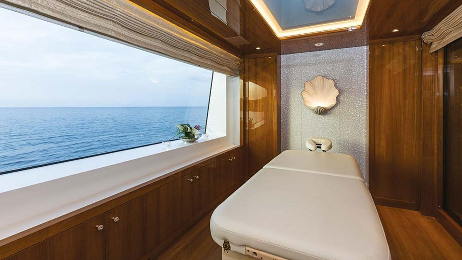 a bedroom with a large bed aboard SEAKID II Yacht for Sale