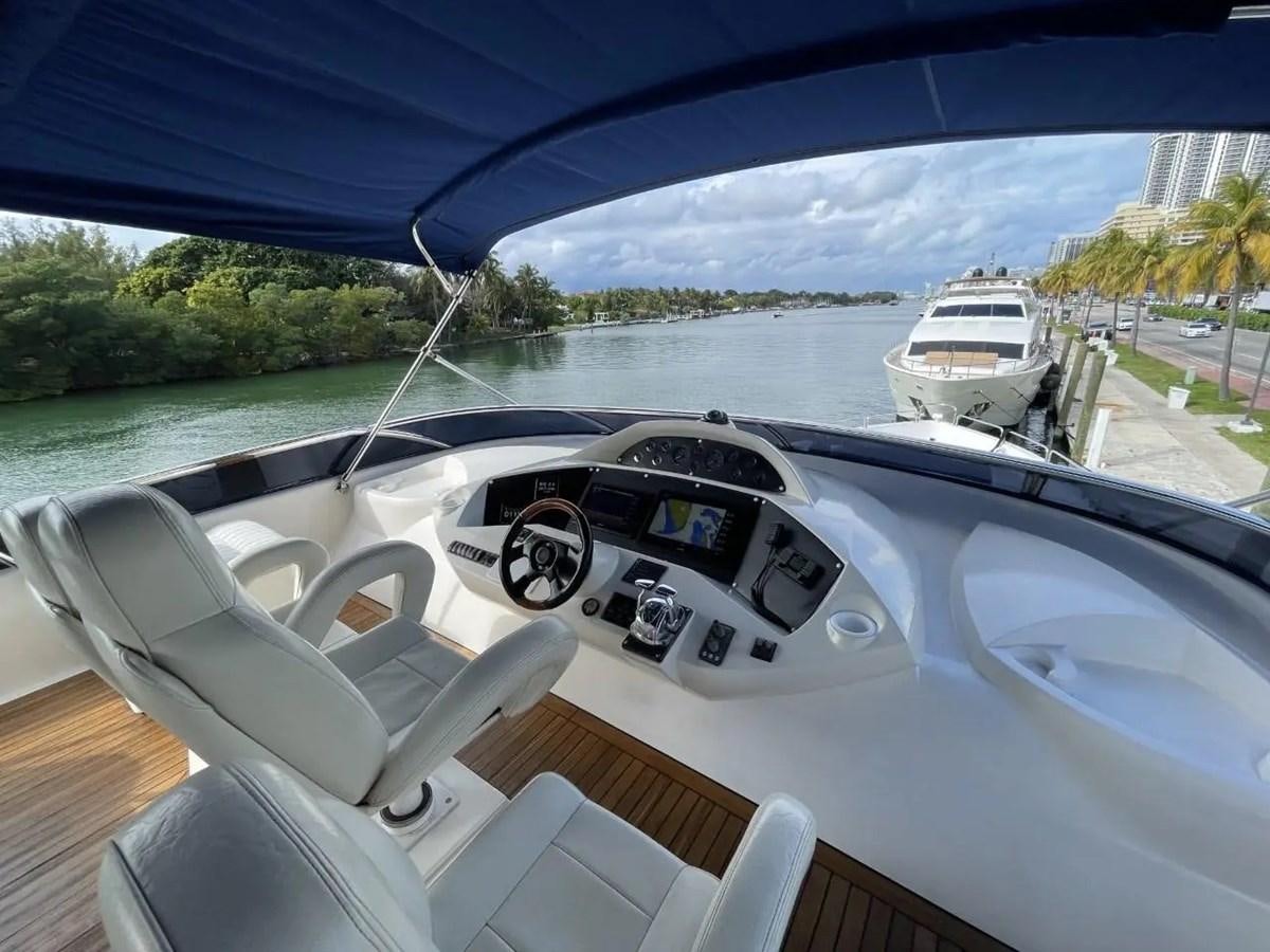 a white car with a black interior aboard 94 YACHT Yacht for Sale