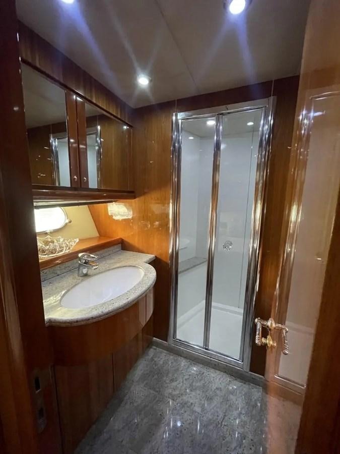a bathroom with a sink and a shower aboard 94 YACHT Yacht for Sale