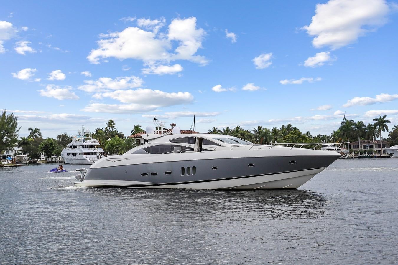a couple of boats on a body of water aboard HER WAY Yacht for Sale