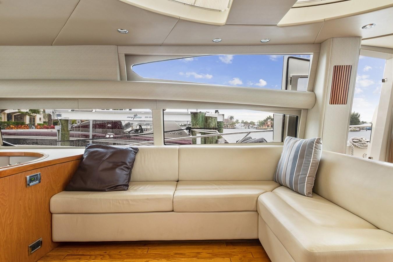 a couch in a room aboard HER WAY Yacht for Sale