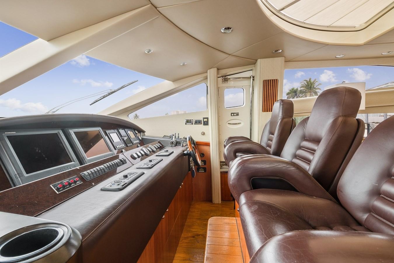a room with a couch and a piano aboard HER WAY Yacht for Sale