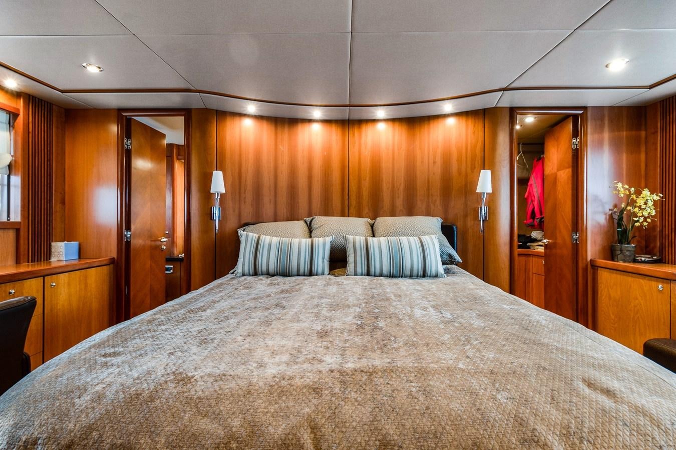 a bed with white sheets aboard HER WAY Yacht for Sale